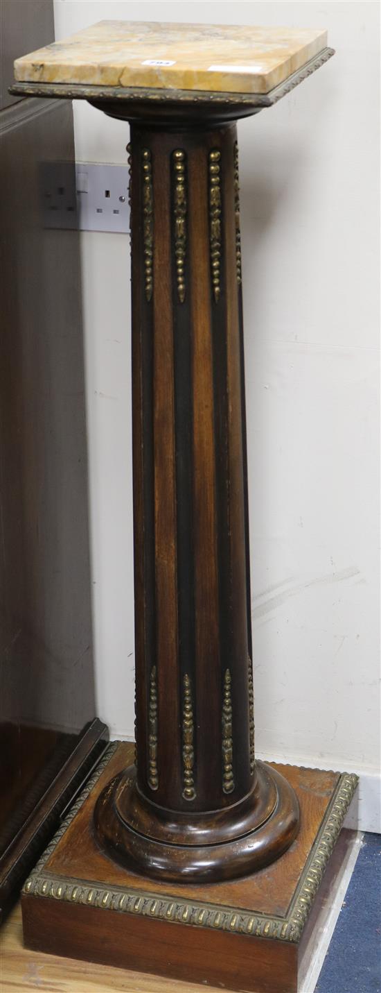 A pair of marble top columns W.35cm